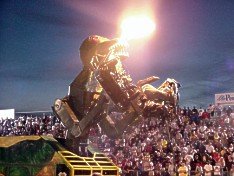 Transaurus digs in, tearing the Chevy Spectrum in two. 7-08-00 by Tim Pratt