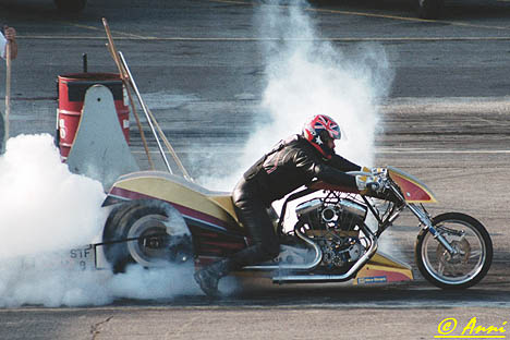 Ben Beneke burns out in his British Top Fuel Harley. Photo by Anni Valder
