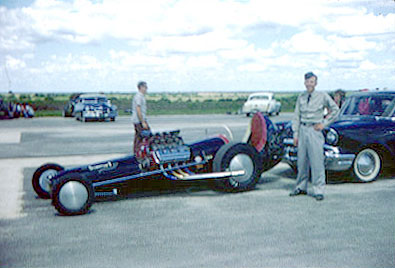 Tommy Ivo standing next to Bobby Langley's car in his boot camp uniform. Photo thanks to Tom Ivo