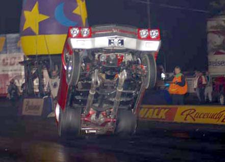Steve Shepler shows the underside of his 70 Chevelle at the Norwalk Halloween Bash. Photo by Peter Ores