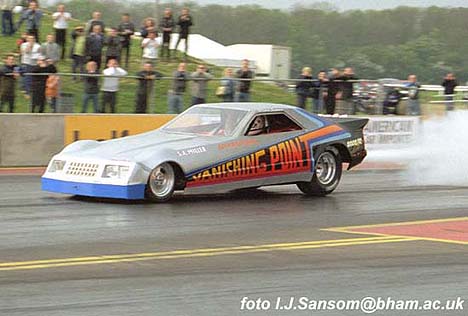 Sammy Miller returned to Santa Pod to thrill the fans in May 2002. Photo by Ivan Sansom