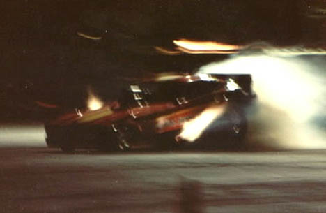 The Luppy, Westerlund, and Wing Mustang II fuel funny car is a blur of light and sound at SIR. Photo by Ralph Reiter