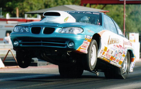 Abe Loewen goes skyward in his Super Stock '98 Grand Am. Photo by Blair Alderton
