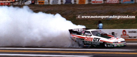 John Force does what it takes to get the fans on his side and the sponsors on the side of his car. Photo by James Morgan