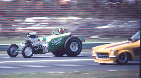 Gene Terenzio grows the tires on the big end in the Smokin' blown altered. Photo by Peter Kumble