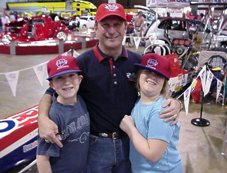 WOW - Jason and Emily Pratt put the squeeze on two time IHRA Top Fuel World Champion Paul Romine. Photo by Tim Pratt