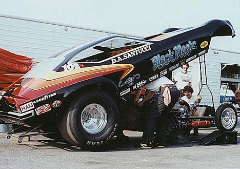 D.A. and crew tune up the Black Magic Vega in 1980. Photo by David Hapgood