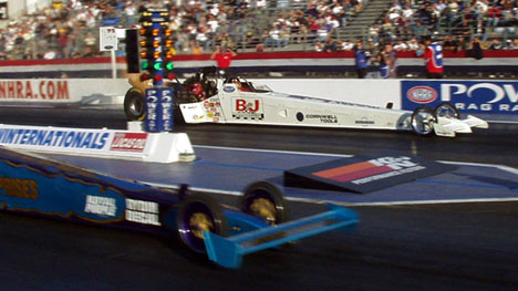 Mike Strasburg racing Clay Millican, who went 4.52 on Friday.